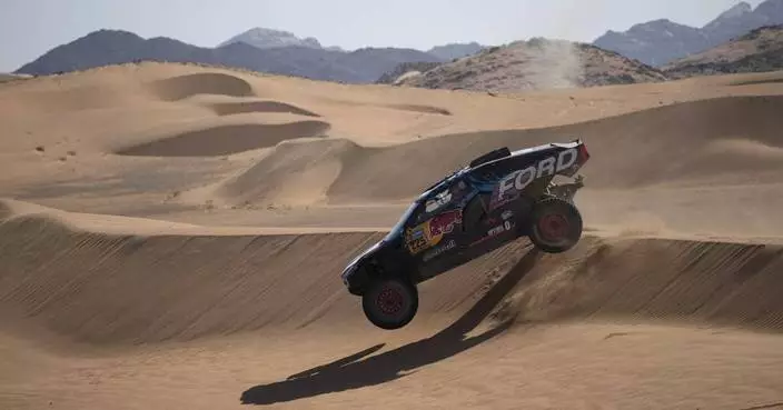 Dakar Rally defending champ Sainz flips in the dunes and is an hour behind