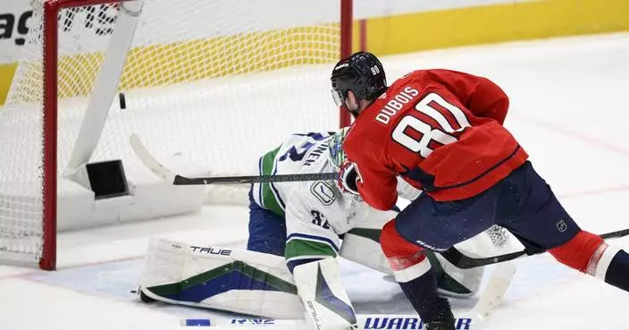 Capitals beat Canucks 2-1 in overtime