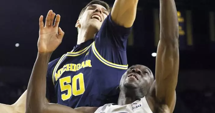 Tre Donaldson scores 7 during Michigan&#8217;s game-closing 9-0 run for a 76-72 victory over Penn State