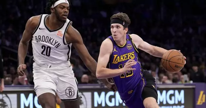 Austin Reaves scores a career-high 38 points as Lakers hold on for 102-101 victory over Nets