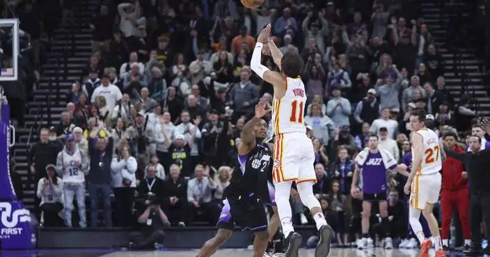 Trae Young&#8217;s 49-foot buzzer-beater lifts Hawks to a 124-121 win over the Jazz