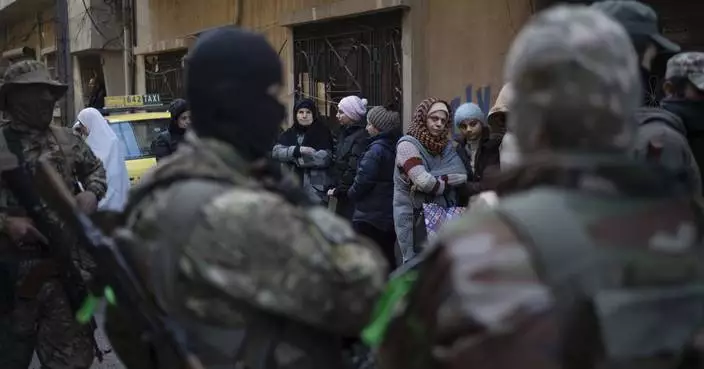 AP PHOTOS: Syria&#8217;s new security forces conduct sweeps in Homs, looking for ousted Assad&#8217;s loyalists