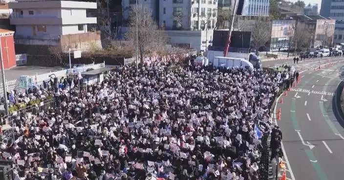 People gather near South Korean presidential compound in support of Yoon