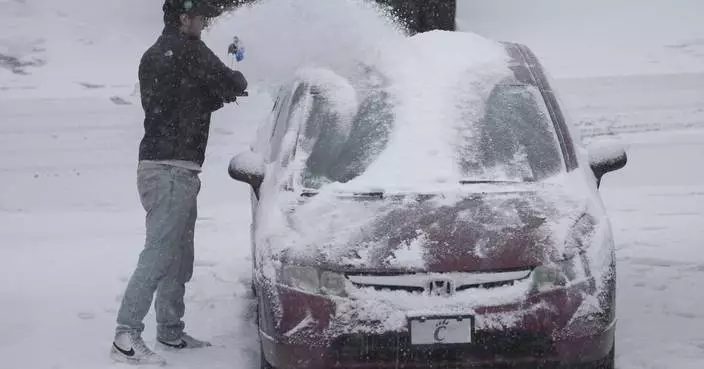 Winter blast of snow, ice and bitter cold grips the US from the Midwest to the East Coast