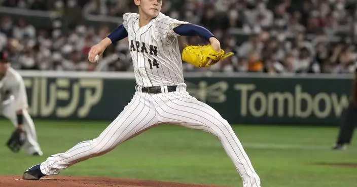 Prized Japanese pitcher Roki Sasaki says he intends to sign with Los Angeles Dodgers