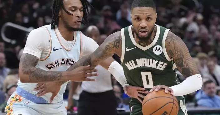 Lillard scores 26 points, Antetokounmpo adds 25 points and 16 rebounds as Bucks beat Spurs 121-105