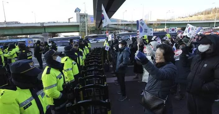 South Korea&#8217;s impeached president defies warrant after hourslong standoff