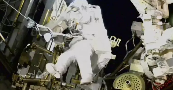 NASA&#8217;s stuck astronaut steps out on a spacewalk after 7 months in orbit