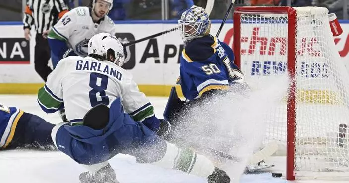 Conor Garland scores twice to help Canucks beat Blues 5-2