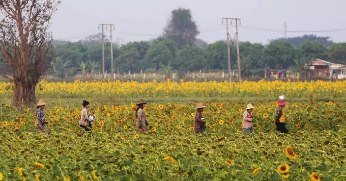 Activist groups urge UN probe of its Myanmar envoy after report alleges ties to Chinese companies