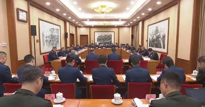 Military delegation to NPC annual session reviews gov't work report