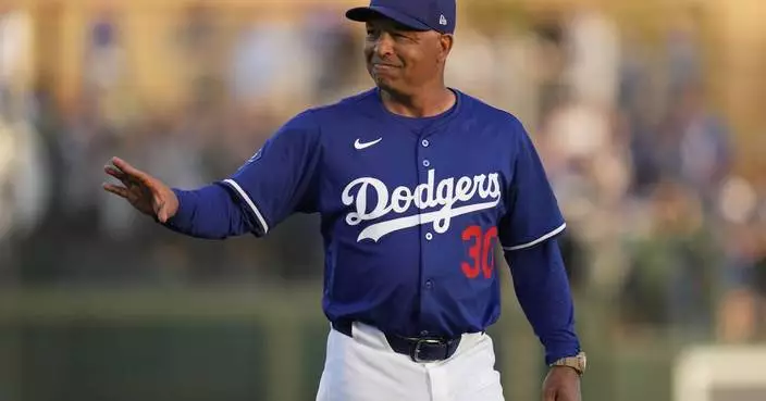 Manager Dave Roberts says he&#8217;s reached &#8216;closure&#8217; in contract talks with Dodgers