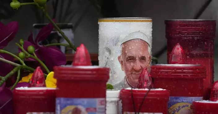 AP PHOTOS: A month of Pope Francis's longest hospital stay with lenses focused everywhere he is not