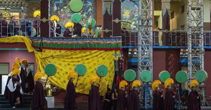 AP PHOTOS: Wrathful deities are invoked in a Tibetan Buddhist dance in a monastery in north India