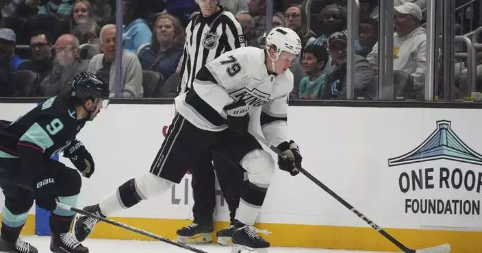 Samuel Helenius scores twice and the Los Angeles Kings hold off the Seattle Kraken 6-5
