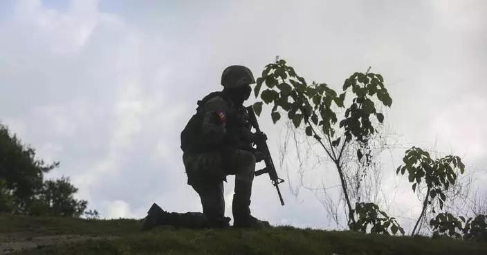 3 Haitian soldiers warring with gangs are slain outside of Port-au-Prince
