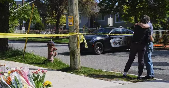AP PHOTOS: A vehicle plows into a Filipino street festival crowd in Vancouver