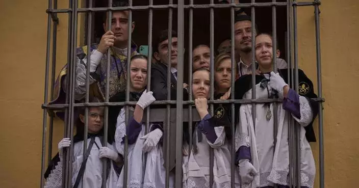 AP PHOTOS: Rain or shine, emotions run high at Seville&#8217;s Holy Week processions in Spain
