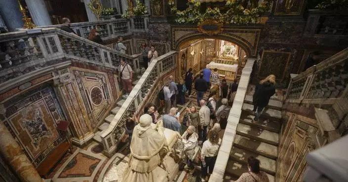 AP PHOTOS: The death of a pope begins a centuries-old ritual to elect his successor