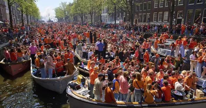 Orange-clad crowds cram into Dutch cities to celebrate king&#8217;s birthday