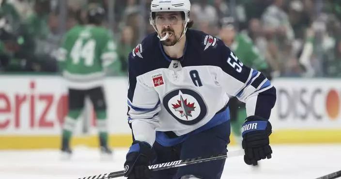 Jets' Scheifele has goal and crucial penalty in Game 6 at Dallas after his father's unexpected death