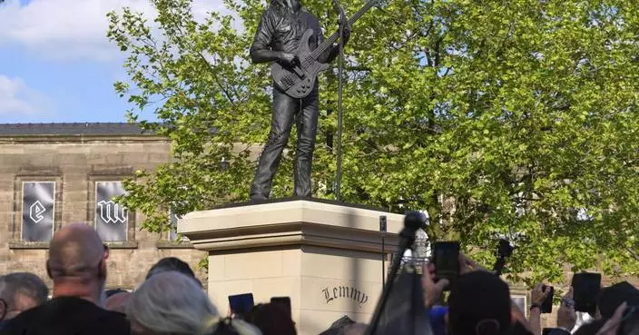 AP PHOTOS: Statue of late Motörhead frontman Lemmy unveiled in English hometown