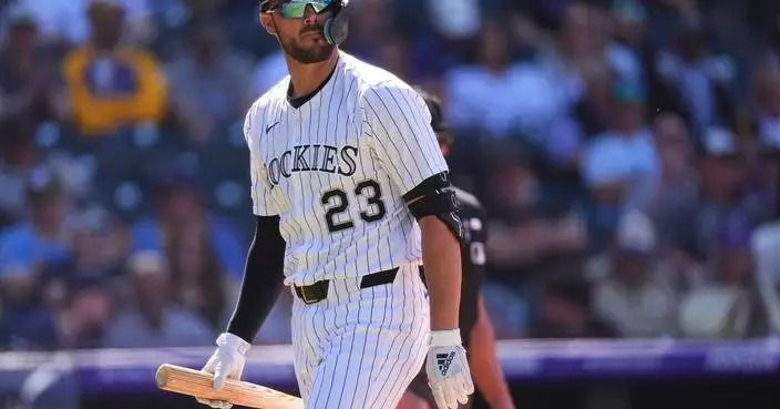 Rockies designated hitter Kris Bryant recovering from procedure on back, no timetable for return