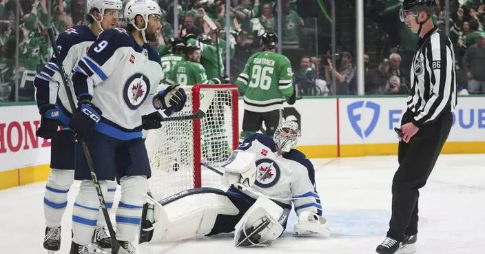 Stars get disputed goal off Petrovic&#8217;s skate to take series lead over top-seeded Jets