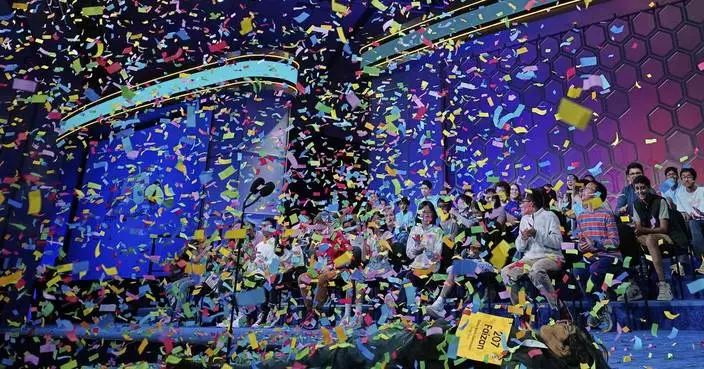 AP PHOTOS: Top young spellers compete in 100th Scripps National Spelling Bee