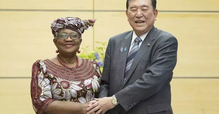 World trade chief says global free trade is in a crisis while on visit to Japan