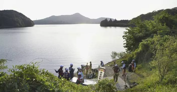 2 crew members missing after a military training plane crashes in central Japan