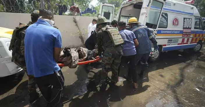 The Latest: Air India plane bound for London crashes with more than 240 onboard