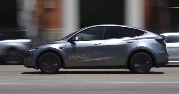 Musk's 'robotaxis' draw regulatory scrutiny after video shows one driving in an opposing lane