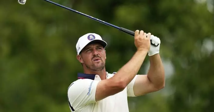 DeChambeau misses cut at US Open, then looks for answers in the rain