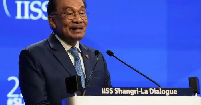 Malaysian leader Anwar wins a reprieve in a lawsuit alleging sexual misconduct