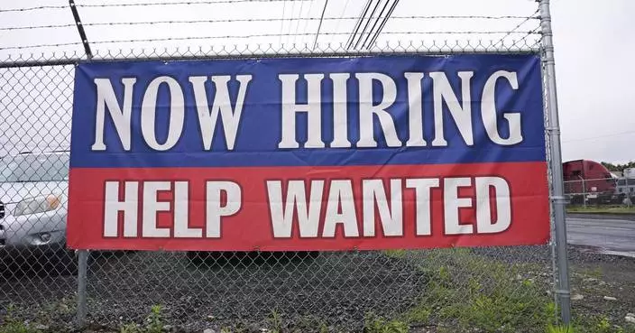 Fewer Americans sought unemployment benefits last week as layoffs remain low
