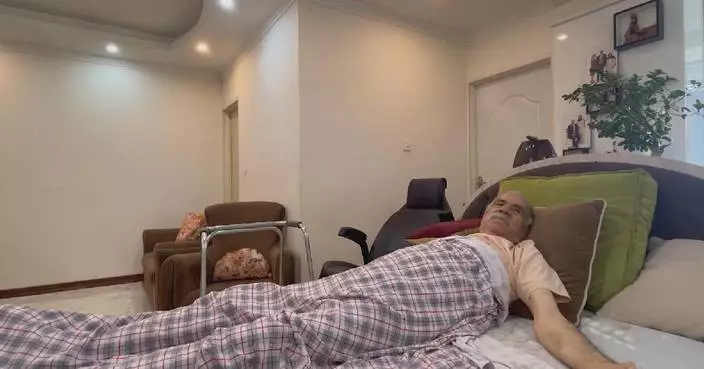 Elderly man recounts moment of injury by massive explosion in Tehran