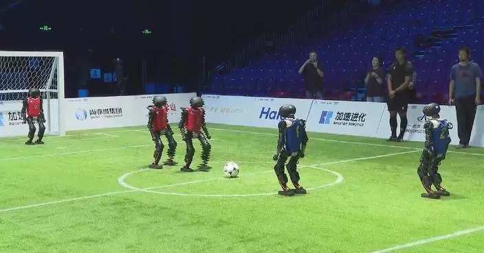 Fully autonomous soccer robots gear up for Beijing showdown in futuristic finale