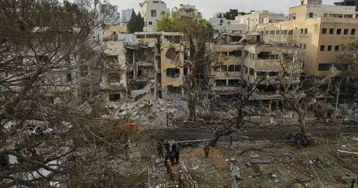 The Latest: Iran launches a new wave of missile attacks on Israel as conflict enters fourth day
