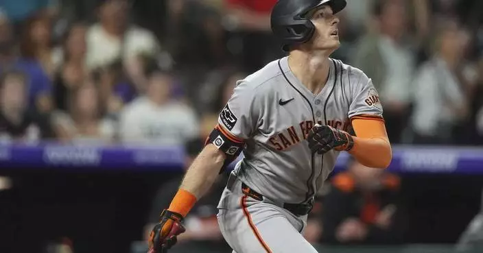 Giants rally again to beat lowly Rockies 10-7 for 7th straight win
