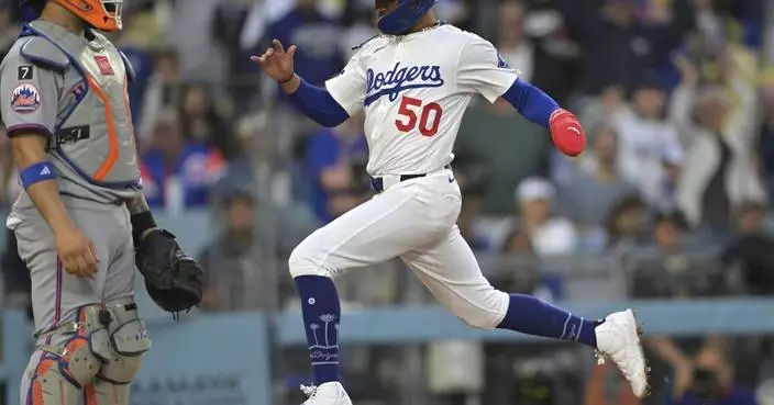 Muncy&#8217;s 2 homers and Freeman&#8217;s RBI double lift Dodgers over Mets 6-5 in 10 innings