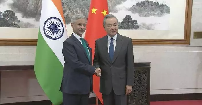 China, India should adhere to good-neighborliness, friendship: Chinese FM