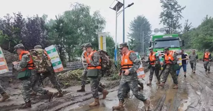 Emergency rescue, relief efforts underway in flood-hit Beijing suburbs