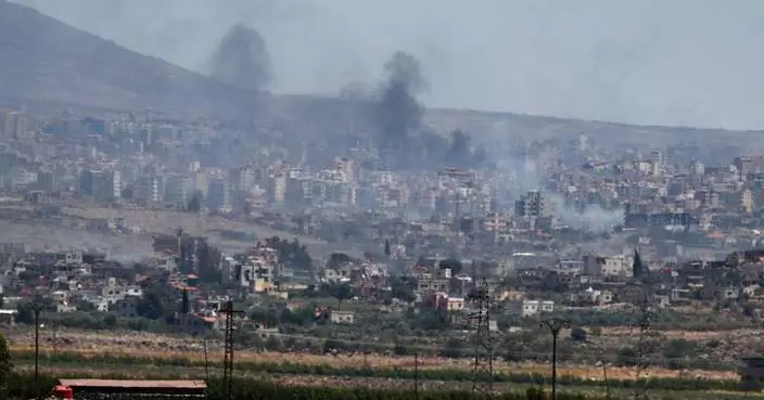 Israel strikes in Damascus as clashes between government and Druze minority rage on