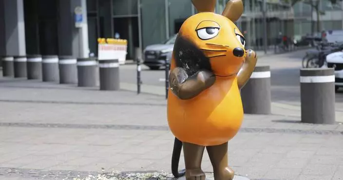 Vandals set fire to a mouse statue that&#8217;s a TV star and mascot for a German broadcaster