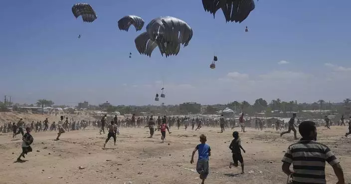 Photos show Palestinians pursuing food aid  after the latest air drops in Gaza