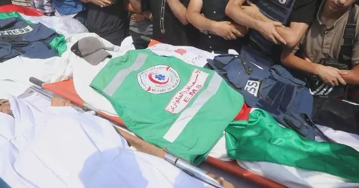 Mourners gather in Gaza for funeral of 5 Al Jazeera staff killed by Israel