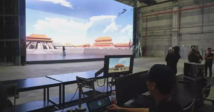 Film base in Zhejiang impresses media people with cutting-edge technologies