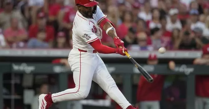 Andujar hits a grand slam to help Greene and the Reds beat the Phillies 8-0