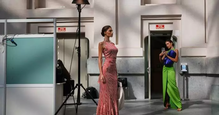 A look at models backstage during Spain Fashion Week, in photos